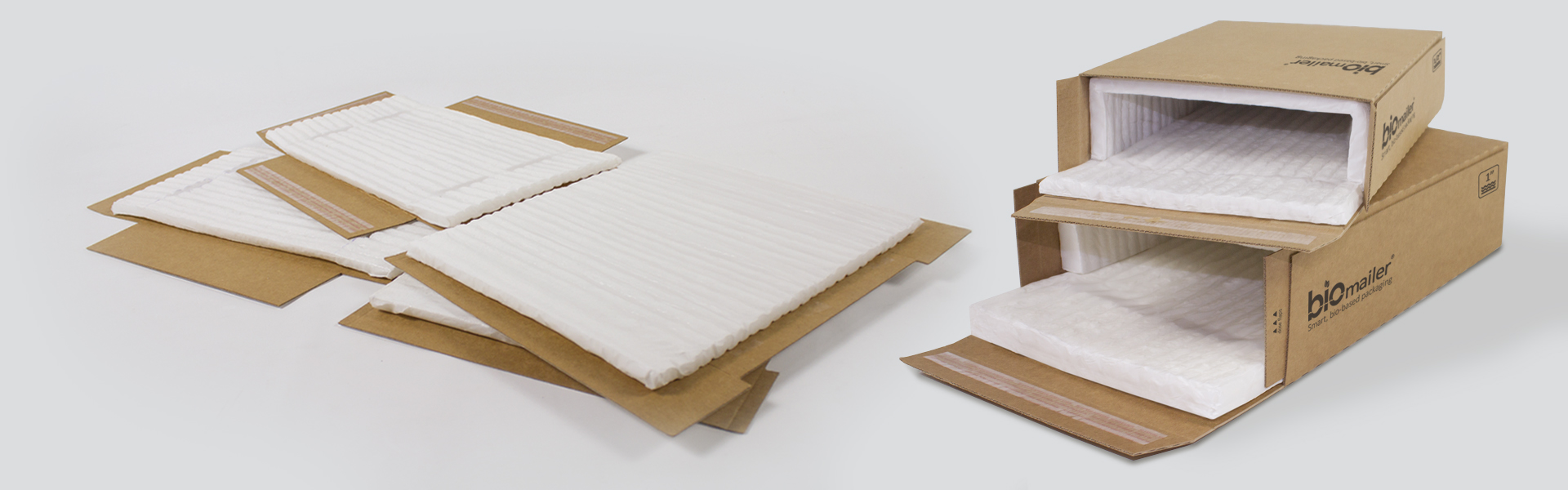 Flat and assembled Biomailer® eco-friendly shipping mailers with protective cushioning.
